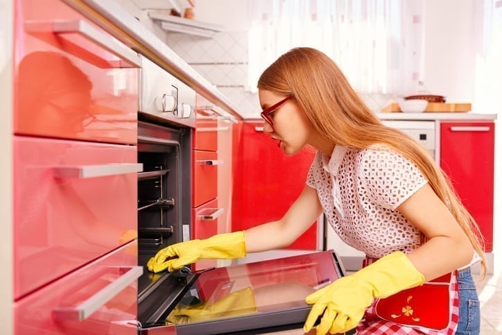 https://www.ovenpride.com/wp-content/uploads/2020/04/woman-cleaning-oven.jpg